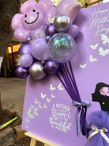 Our "Regal Purple Greetings" postcard is full of cheerful details, from the smiley-face flower balloon to the shimmering butterfly accents. It's a fun and beautiful way to wish someone a Happy Mother's Day.