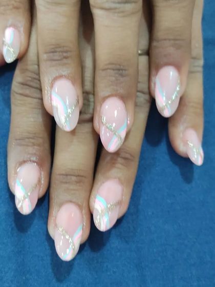 A similar abstract design with soft pastel swirls and a hint of silver glitter for a dreamy look.