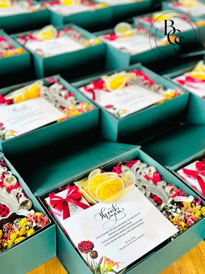 These return gift hampers are a stylish way to say thank you to your wedding guests. The teal boxes are filled with colourful goodies and a personalized thank you card, leaving a lasting impression of your special day.