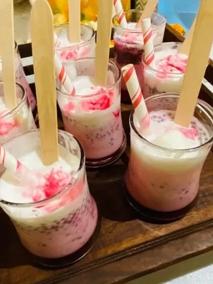 Our Rose Falooda is a refreshing and layered dessert drink. Served in glasses with sabja seeds and rose syrup, it's a perfect sweet treat for house parties and summer events.