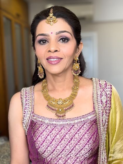 A beautiful portrait showcasing the final look. The makeup enhances her natural grace, proving that soft glam is perfect for creating a timeless and sophisticated appearance at any age.