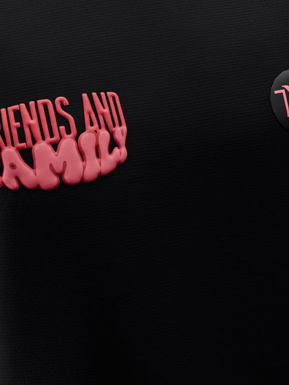 This close-up shows the 'Friends and Family' puff print detail, a special touch on some of our exclusive pieces.