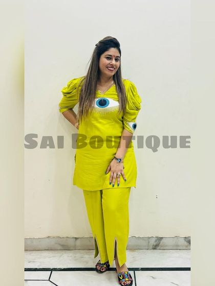 Another look at the quirky and fun lime green evil-eye co-ord set.