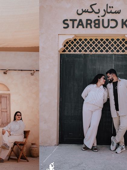 A cool, urban-style pre-wedding shot of a couple posing in front of a Starbucks in a unique, traditional-style building.