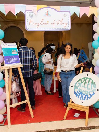 The entrance to our "Kingdom of Play" zone, buzzing with excitement. The balloon arch and welcoming signs set the stage for a world of fun inside.