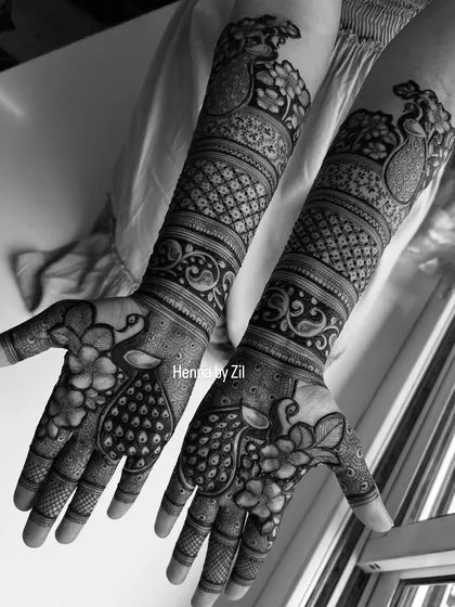 The same peacock and floral design in black and white, which highlights the clean lines and detailed shading of the artwork.