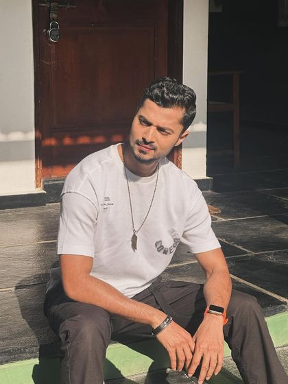 A candid moment, looking away from the camera. This creates a natural and relatable feel.