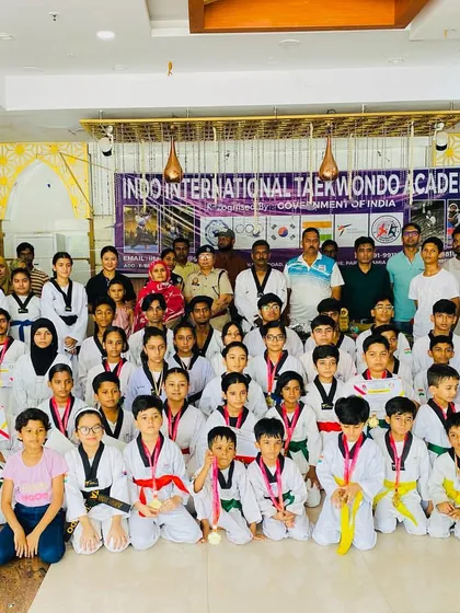 I am incredibly proud of my students' achievements. This photo captures a medal and belt distribution ceremony, an event honored by the presence of the ACP of the Crimes Against Women Cell, which shows the official recognition of our training's importance.
