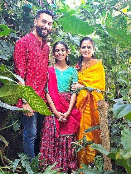 Our family portrait in the urban jungle. This garden is a legacy of love for nature that we are passing down to our daughter.