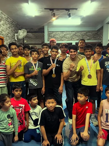 Another picture of our victorious team. The smiles on their faces show the result of their dedication.