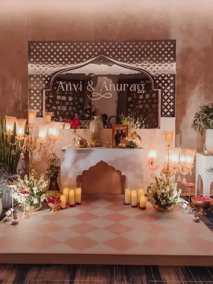 The little details are where the magic happens. This welcome setup for a modern royalty themed event used architectural elements, soft candlelight, and lush florals to introduce the theme and create a warm, inviting atmosphere from the moment guests arrived.