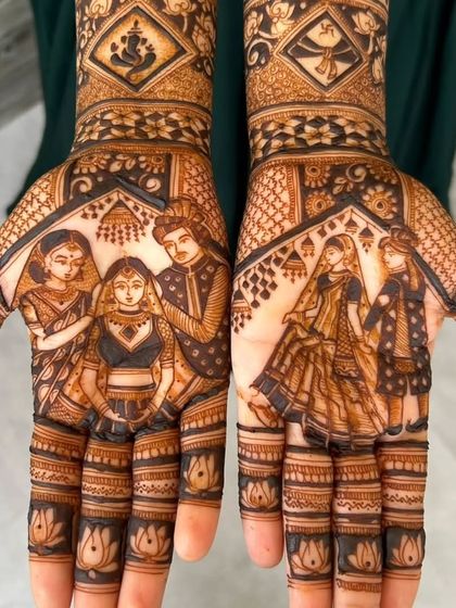 The palms of a family-centric bridal mehandi. This design beautifully captures the bride with her family, creating a design that is full of love and emotion.