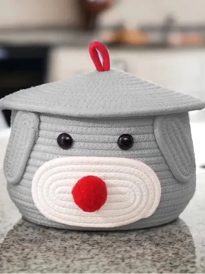 This grey teddy storage basket is a great neutral option that fits with any decor style.