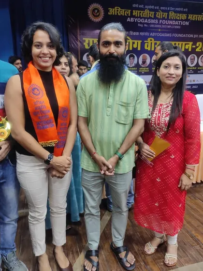 Posing with fellow yogis and mentors at the event. These moments reinforce our mission and inspire us to continue our work with passion and dedication.
