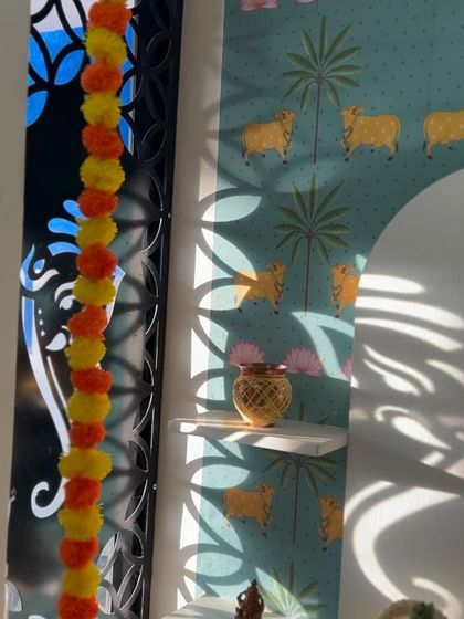 The jali on the west wall of the pooja room casts beautiful, shifting shadows of Ganesh throughout the day, an example of using sciography (the study of light and shadow) to enhance a space.