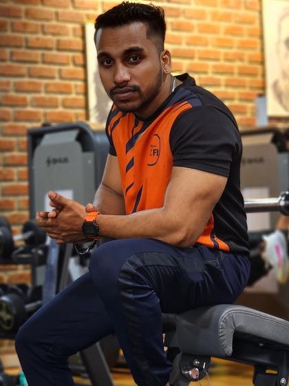 My expression shows my focus. I am always thinking about the next step in my fitness journey and how to help my clients with theirs.