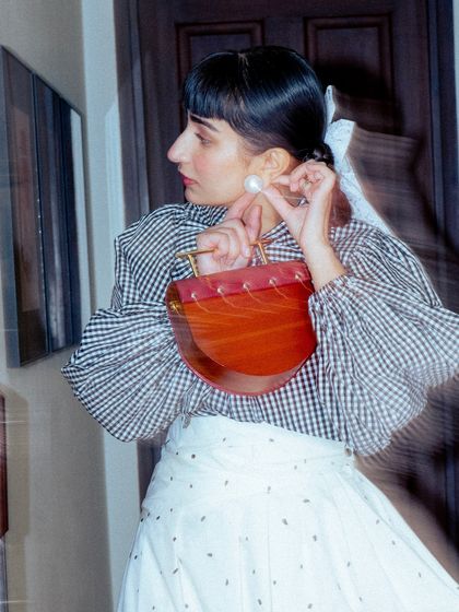 A candid, motion-blurred shot capturing the details of my accessories for the GQ event.