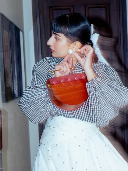 A candid, motion-blurred shot capturing the details of my accessories for the GQ event.