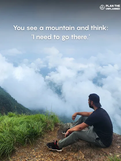 A lone trekker looking out at a mountain range. This captures the feeling of seeing a mountain and thinking, "I need to go there."