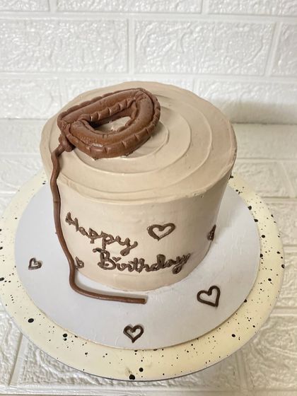 Another angle of the understated and elegant minimalist birthday cake.