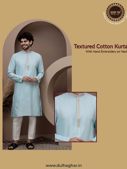 This graphic showcases a textured cotton kurta in a light blue, with a close-up of the hand-embroidered neck, emphasizing the craftsmanship.