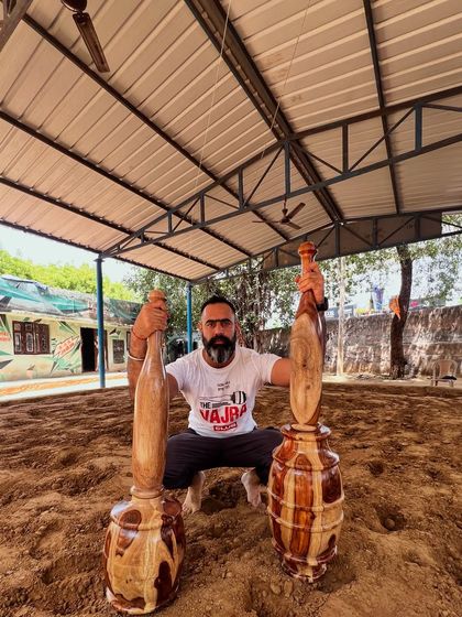 Me, in the akhara, with the tools of our ancestors. It's a humbling experience to train where generations of strongmen have trained before. This is about going deeper, to the strength we were never meant to forget.