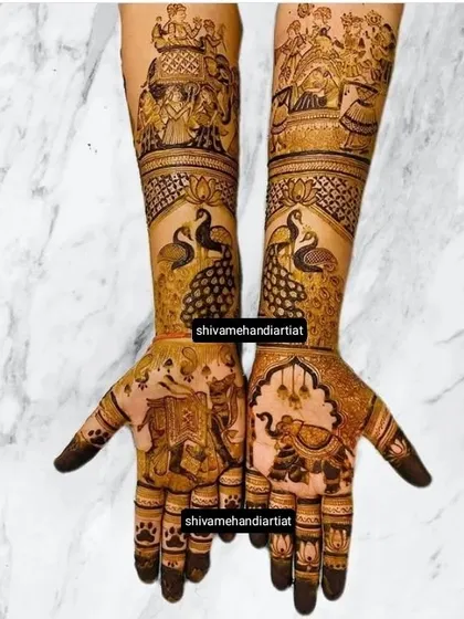 A grand design featuring a royal procession with the groom on an elephant, peacocks, and other traditional wedding day motifs.