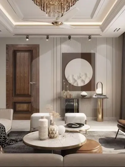 Natural light and clean lines define this elegant living room. We used a soft, neutral color palette, minimalist wall art, and floor-to-ceiling windows to create a bright and airy space that feels both luxurious and connected to the outdoors.