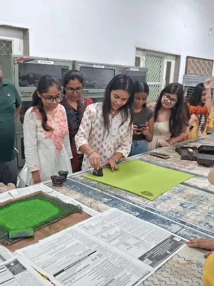 We believe in learning by doing. Here, one of our fashion students gets hands-on experience with traditional block printing techniques during an industrial visit, connecting classroom theory with real-world craft.