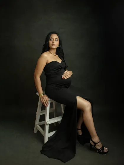 A confident and glamorous seated pose. This shot combines elegance with a touch of modern style, making you look and feel amazing.