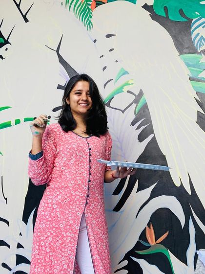 This vibrant tropical mural featuring two large macaw parrots was a joy to create. The bold colors and dense foliage on a black background make for a dramatic and stunning photo point in a restaurant.