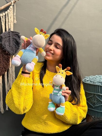 I'm so proud of our Amigurumi giraffe collection. Holding them reminds me of all the hard work our team puts into creating these handmade treasures.