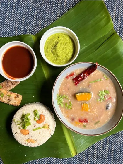 A delightful combo from our Shravan menu: Jeera Kaju Varai Pulao and Singdana Amti. This dish offers a perfect balance of flavors and textures for a satisfying fast.
