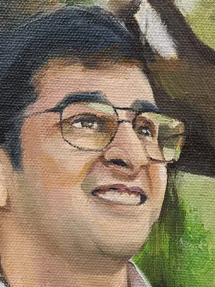 Close-up of the groom's face from the impressionist-style portrait.
