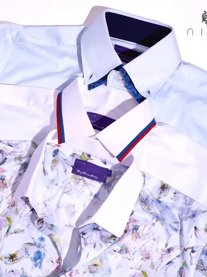 A trio of our favorite shirt designs, including a classic white, a modern striped collar, and a beautiful floral print.