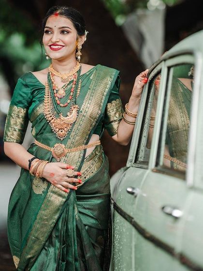 Here is Rashmi again, this time in a deep green silk saree for another baby shower event. The rich color symbolizes life and prosperity.
