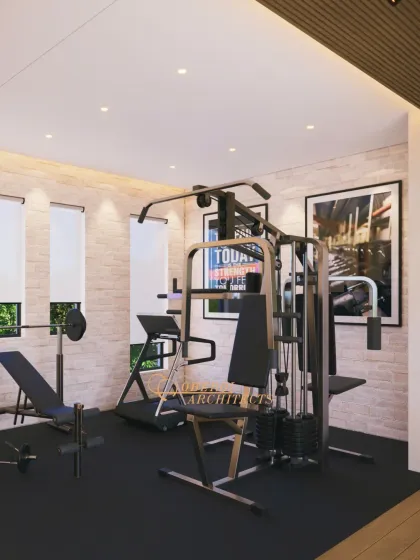 The home gym is designed to be an inspiring space, with motivational artwork and large windows that bring in natural light.