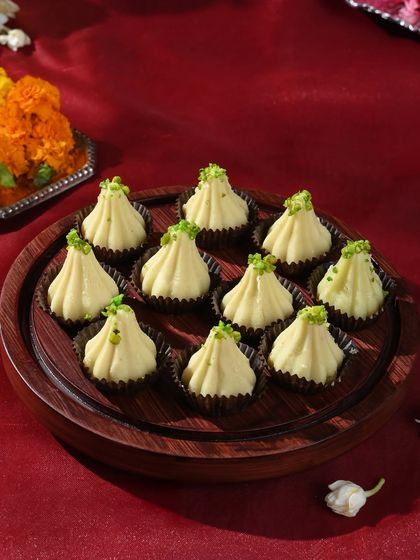 My exquisite kesar pista modaks, handcrafted with the finest ingredients, are a perfect sweet treat for the festival.
