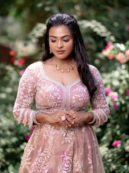 Another shot from the "art of subtle" series. The model looks serene and beautiful in her pink lehenga, with makeup that is soft and elegant.