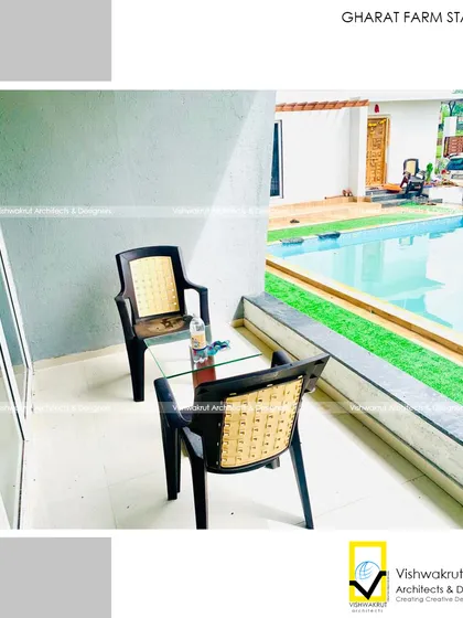 A quiet seating nook right by the pool at Gharat Farm Stay. I design these small, intimate spaces to give guests a private corner to relax and enjoy the peaceful atmosphere of the resort.