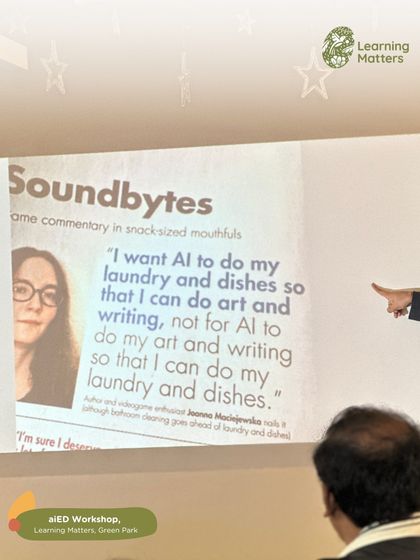 A powerful quote is projected during our aiED workshop: "I want AI to do my laundry and dishes so that I can do art and writing, not for AI to do my art and writing so that I can do my laundry and dishes." This sparks a critical conversation on the role of AI in education.