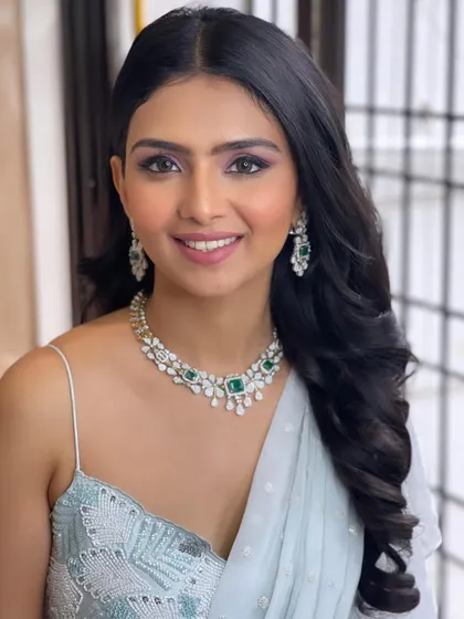 Another portrait of the Roka bride, her simple hairstyle looking elegant and fresh.