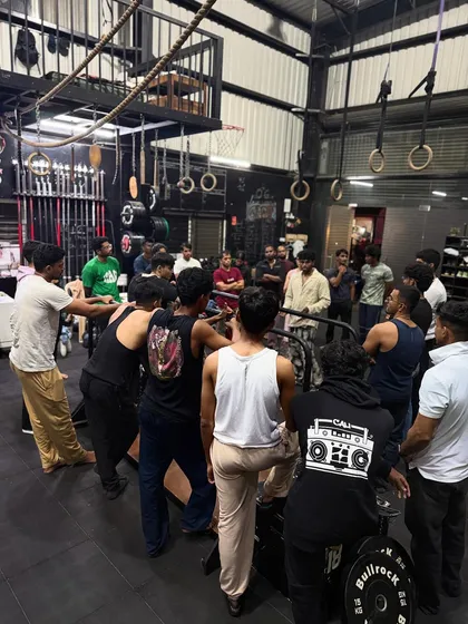 The crowd gathers for the after-party showcase at OG BAR WARS. The energy is electric as athletes demonstrate their skills.