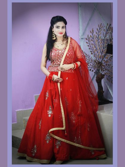 When in doubt, wear red. This simple yet elegant red lehenga is a versatile choice for any festive occasion.