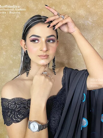 Master the art of celebrity and red-carpet glamour. This look focuses on creating a chic, sophisticated style with a bold smokey eye, flawless contouring, and modern accessories, perfect for high-profile events.