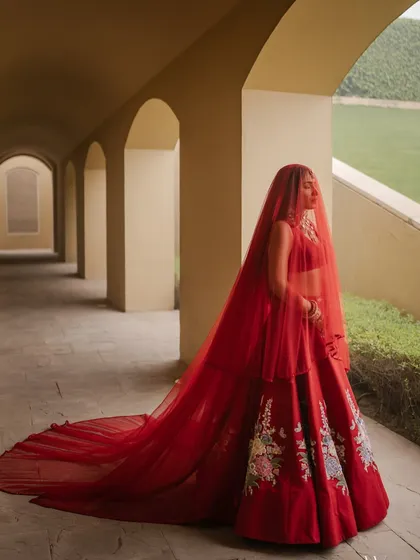 The drama of a long veil adds so much to the bridal look. For this shot, the makeup was designed to be striking even when partially covered, with emphasis on beautifully defined eyes and flawless skin.