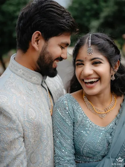 The best moments are the ones you don't plan. This candid laugh during their engagement ceremony is a perfect example of the genuine joy we love to capture. It’s these real emotions that make your story timeless.