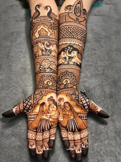 This full bridal design includes portraits of the couple exchanging varmalas, a classic wedding scene captured in henna.