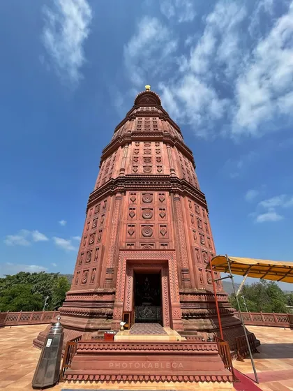 The impressive architecture of a temple dedicated to Lord Krishna, shot against a bright blue sky. I document the sacred spaces where these festivals are celebrated.