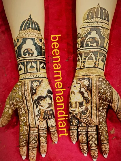 A unique bridal design celebrating sisterhood, with portraits of two sisters on the palms. The arms are decorated with royal palace and elephant motifs.